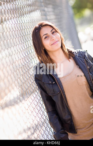 Beautiful Happy Mixed Race Young Woman Portrait Outside. Stock Photo