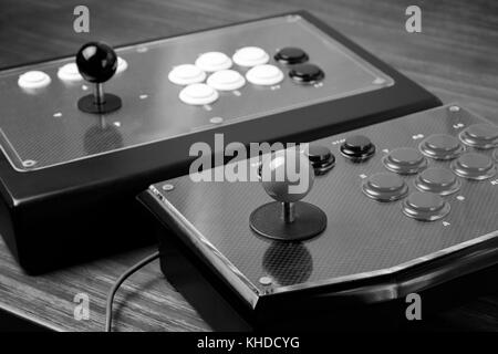Real Arcade Joystick on Wood table (Black and white) Stock Photo