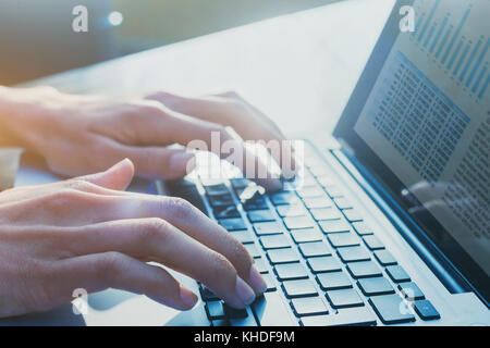 business analytics concept, close up of hands of business person computing report results for company Stock Photo