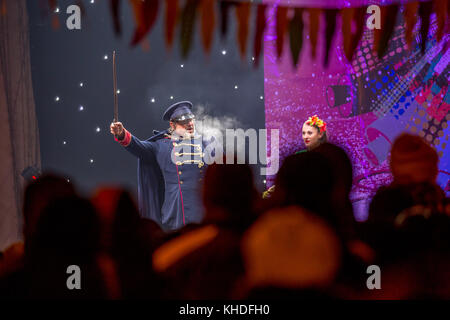 PERNIK, BULGARIA - JANUARY 27, 2017: Male actor with old military uniform with hat and big sword is playing his play at the opening ceremony of Surva, Stock Photo