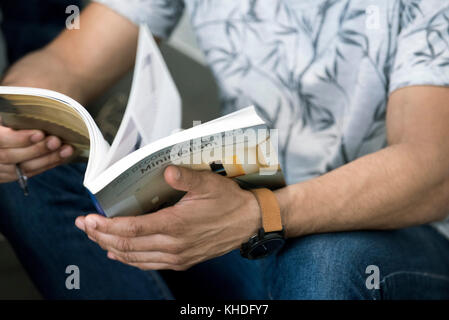Man reading book Stock Photo