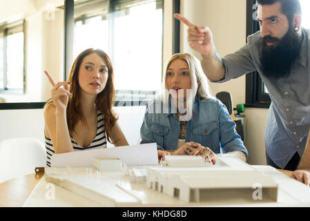 Architects discussing project Stock Photo