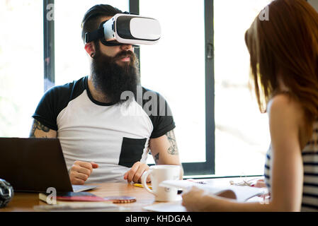 Man using virtual reality simulator Stock Photo