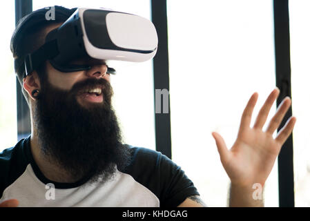 Man using virtual reality simulator Stock Photo