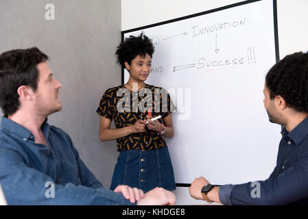 Student asking teacher question Stock Photo