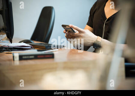 Man using smart phone Stock Photo