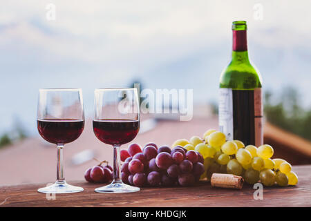 two glasses of red wine in restaurant, background Stock Photo
