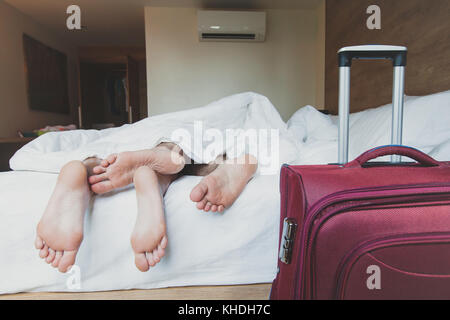 couple of tourists sleeping in hotel room, travel accommodation Stock Photo