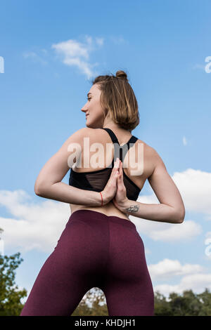 Woman Doing Yoga in Reverse Prayer Pose. Pashchima Namaskarasana Stock  Image - Image of conscious, body: 111048713