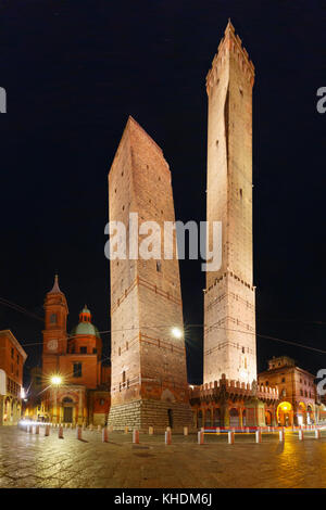 Famous Two Towers of Bologna at night, Italy Stock Photo