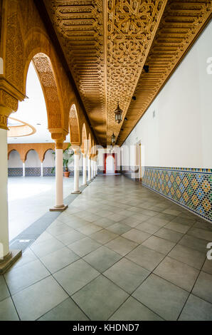 arabic arcade colonnade portico with wooden ceiling with ornaments Stock Photo