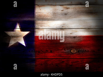 Flag of Texas USA painted on grungy wood plank background Stock Photo
