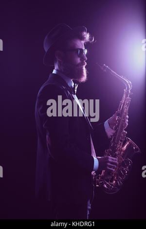 Saxophone player on stage Stock Photo