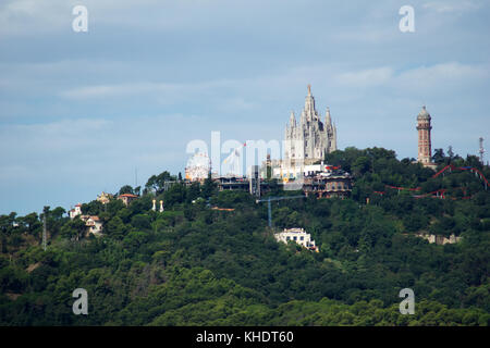 BARCELONA, SPAIN - AUG 30th, 2017: Panoramic view of the city Tibidabo Mountain in far distance from the bunkers de carmel on a cloudy day Stock Photo