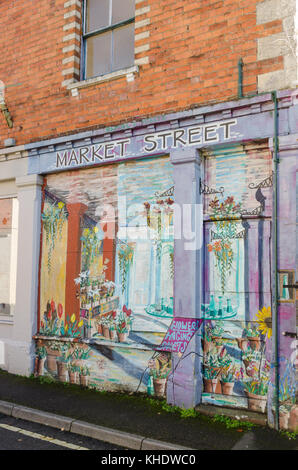 Empty shop painted to look like a florists shop in Market Street, Nailsworth, Gloucestershire Stock Photo