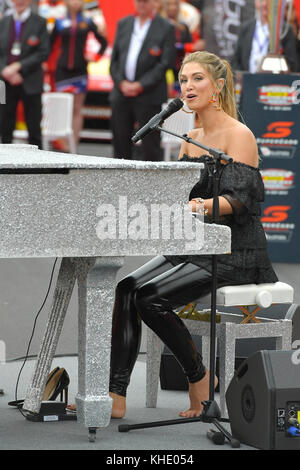 Delta Goodrem performs for the crowd and VIPs ahead of the start of the Supercheap Auto Bathurst 1000 at the Mount Panorama Circuit in Bathurst, Australia.  Featuring: Delta Goodrem Where: Bathurst, New South Wales, Australia When: 08 Oct 2017 Credit: WENN.com Stock Photo