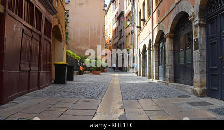 The old quarter in Lyon France, but indicative of many towns and cities in Europe, with central gutter running up the street Stock Photo