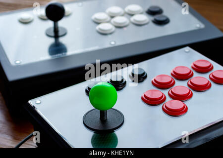 Real Arcade Joystick on Wood table Stock Photo