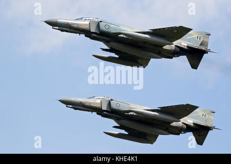 FLORENNES, BELGIUM - JUN 15, 2017: Two Greek Air Force F-4 Phantom fighter jet planes in formation flight. Stock Photo