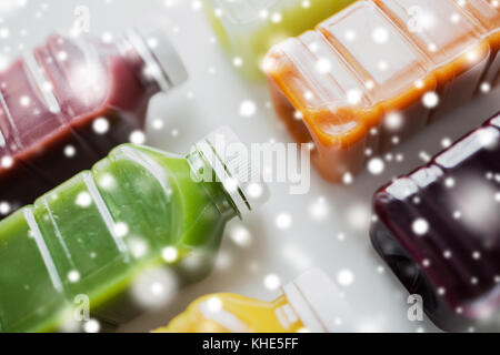 bottles with different fruit or vegetable juices Stock Photo