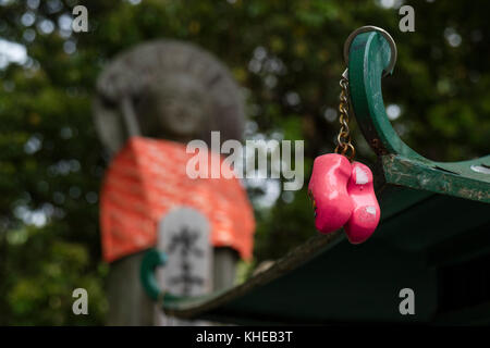 Nara, Japan -  May 31, 2017: Traditional dutch wooden shoes souvenir as a gift to the Japanese temple and jizo Stock Photo