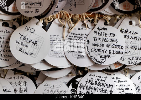 Nara, Japan - May 31, 2017:  Ema, small wooden plaques with wishes or prayers written on them at the Kasuga Taisha shrine Stock Photo
