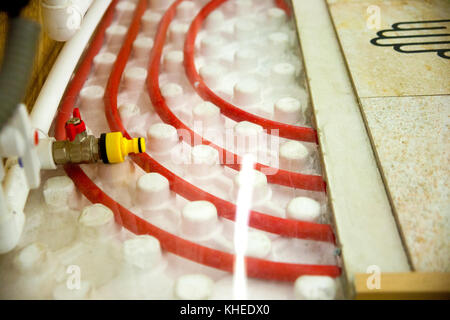 Floor heating pipe. Installation of engineering systems in a building. Stock Photo