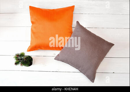 https://l450v.alamy.com/450v/khen4h/two-pillows-on-a-white-wooden-background-flat-lay-top-view-photo-mockup-khen4h.jpg