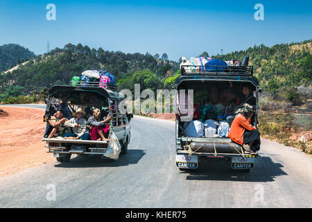 KALAW, MYANMAR-MARCH 5,2017: Burmese people on the light trucks in Kalaw on March 5, 2017, Myanmar.They are used as a taxi because people can Stock Photo