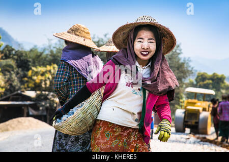 KALAW, MYANMAR-MARCH 5, 2017: Burmese women are working to build a road near Kalaw on March 5, 2017, Myanmar. (Burma) Stock Photo