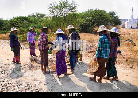 KALAW, MYANMAR-MARCH 5, 2017: Burmese women are working to build a road near Kalaw on March 5, 2017, Myanmar. (Burma) Stock Photo