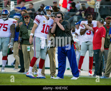 Santa Clara, CA. 12th Nov, 2017. New York Giants quarterback Eli Manning (10) talks to New York Giants head coach Ben McAdoo during the NFL football game between the New York Giants and the San Francisco 49ers at Levi's Stadium in Santa Clara, CA. The 49ers defeated the Giants 31-21.Damon Tarver/Cal Sport Media/Alamy Live News Stock Photo