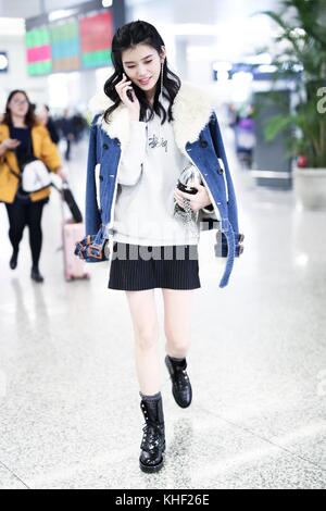 Shanghai, Shanghai, China. 17th Nov, 2017. Shanghai, CHINA-17th November 2017:(EDITORIAL USE ONLY. CHINA OUT) Chinese model Ming Xi shows at the airport in Shanghai, November 17th, 2017. Ming Xi's professional modeling career started in 2009 after she attended a TV competition. Her international modeling career took off in 2011 after she walked her first well-known runway debut for Givenchy Haute Spring Show.[5] In the same year, Ming Xi modeled the Givenchy ready-to-wear collection and appeared as the face of Givenchy's Fall/Winter publicity advertising campaign. Ming Xi also modeled for Stock Photo