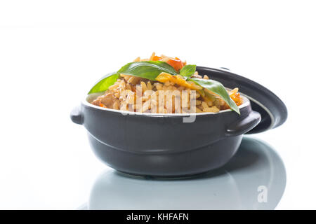 Pilaf with beef, carrots, onions, garlic, pepper and cumin. A traditional dish of Asian cuisine. Stock Photo