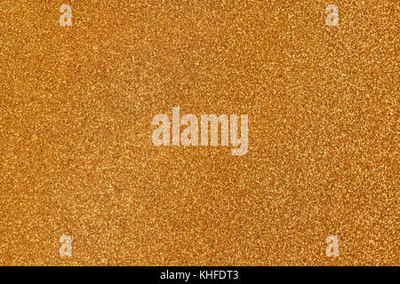 Golden glitter surface close up. Texture and background Stock Photo