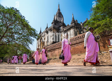 BAGAN, MYANMAR, MARCH 9, 2017: Buddhist nuns are walking in old Bagan on March 9, 2017. Myanmar. (Burma) Stock Photo