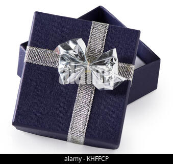 A tiny navy blue gift box with silver bow, possibly for jewelry, opened, isolated on white. Stock Photo