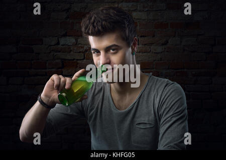 Cool handsome guy having a beer and relaxing Stock Photo