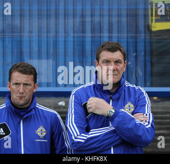 Tommy Wright (right) at Windsor Park Belfast. Northern Ireland v Finland 15 August 2012. Wright was the Northern Ireland goalkeeping  coach under Michael O'Neill. To the left is Billy McKinley who was O'Neill's then coach. Stock Photo