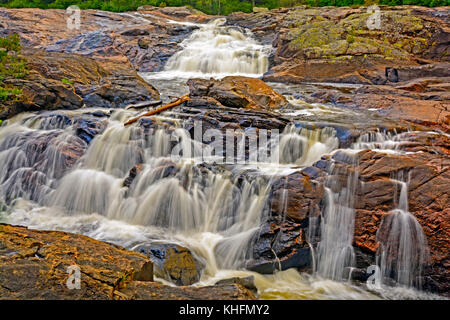 Colorful Cascade on Sand Creek in Lake Superior Provincial Park in Ontario Stock Photo