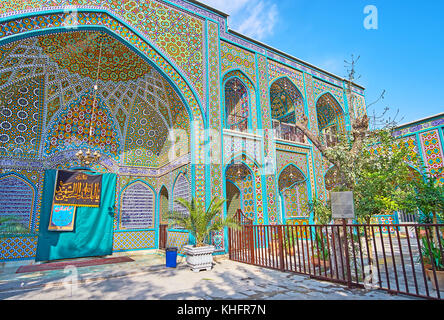 TEHRAN, IRAN - OCTOBER 11, 2017: The traditional design of Shrine of Syed Nasiruddin, covered with glazed tiles with fine Persian patterns, on October Stock Photo