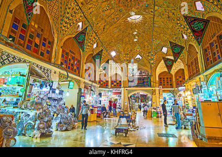 TEHRAN, IRAN - OCTOBER 11, 2017: Panorama of Timcheh-e Hajeb-od-Dowleh courtyard in Grand Bazaar, interior is decorated with stained glass windows, br Stock Photo