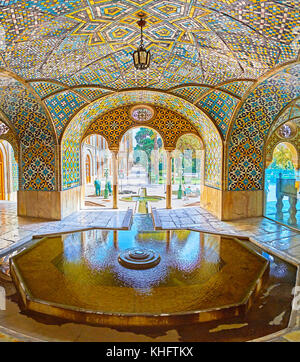 TEHRAN, IRAN - OCTOBER 11, 2017: Panorama with the pond and fountain in Karim Khani Nook (cozy corner) of Golestan palace, on October 11 in Tehran. Stock Photo