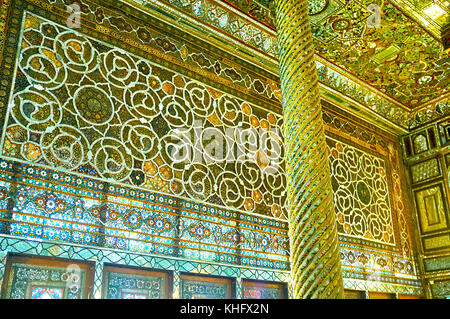 TEHRAN, IRAN - OCTOBER 11, 2017: The  complex patterns of stained glass windows in Emarat-e Badgir (Wind Towers Building) of Golestan palace, on Octob Stock Photo
