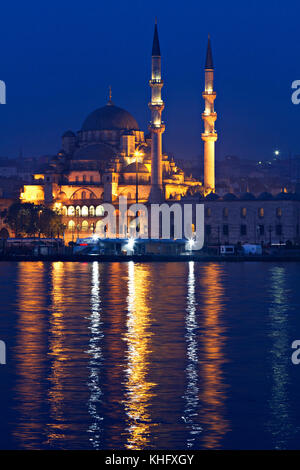 Night scene over the New Mosque known also as Yeni Cami, at the twilight, in Istanbul, Turkey. Stock Photo
