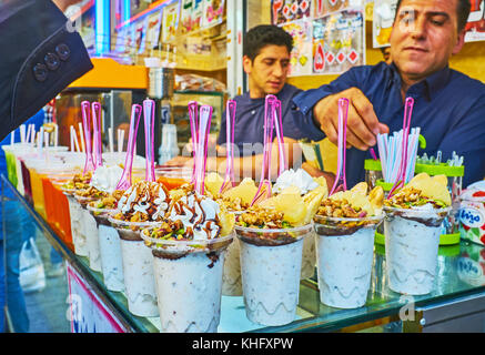TEHRAN, IRAN - OCTOBER 11, 2017: The small cafe in Grand Bazaar, offering creamy desserts, milk shakes, fresh fruit juices and sweets, on October 11 i Stock Photo