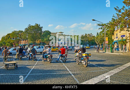 TEHRAN, IRAN - OCTOBER 11, 2017: The bikes wait for the traffic light on the intersection of Amir Kabir and Mostafa Khomeyni streets, on October 11 in Stock Photo