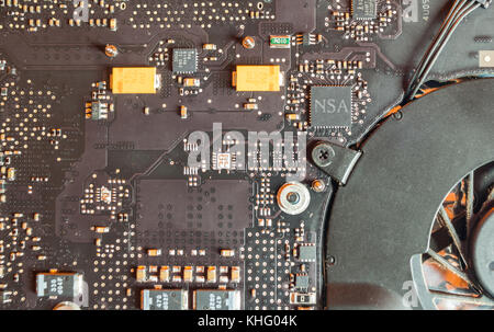 Illustration of a spying cpu Chip in a laptop computer with the NSA letters Stock Photo