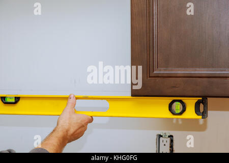 Craftsman kitchen carpenter at kitchen furniture set installation service work Stock Photo