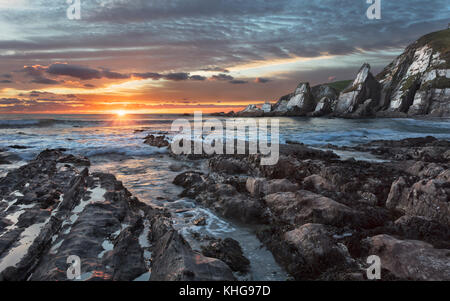 Sunset viewed from Westcombe Bay in the South Hams District of Devon Stock Photo